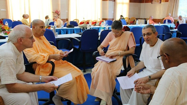 Anuttama Das, Radhanath Swami, Malati Devi Dasi, Braja Bihari Das and Sesa Das deep in discussion during the GBC Organisational Development Meetings.