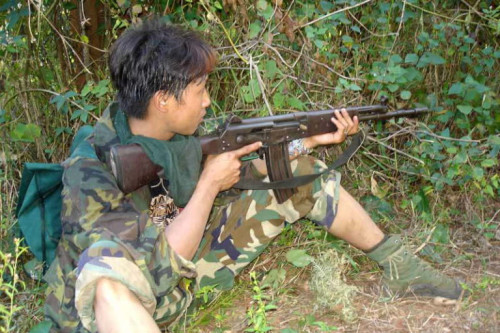 Мальчик-партизан в Бирме во время гражданской войны